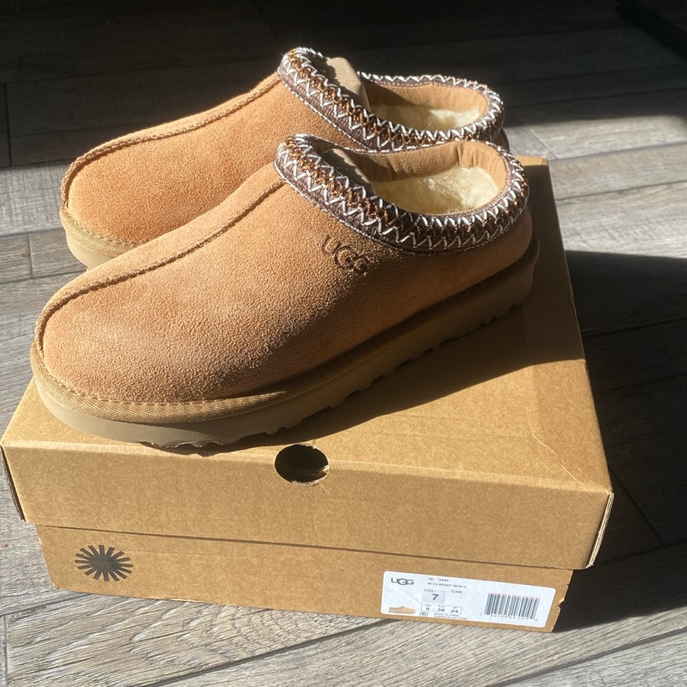 Never been worn, brand new, in the box, smoke free, pet free home.